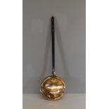 A 19th century copper warming pan, with hammered design and turned and stained shaft 102cm hinge