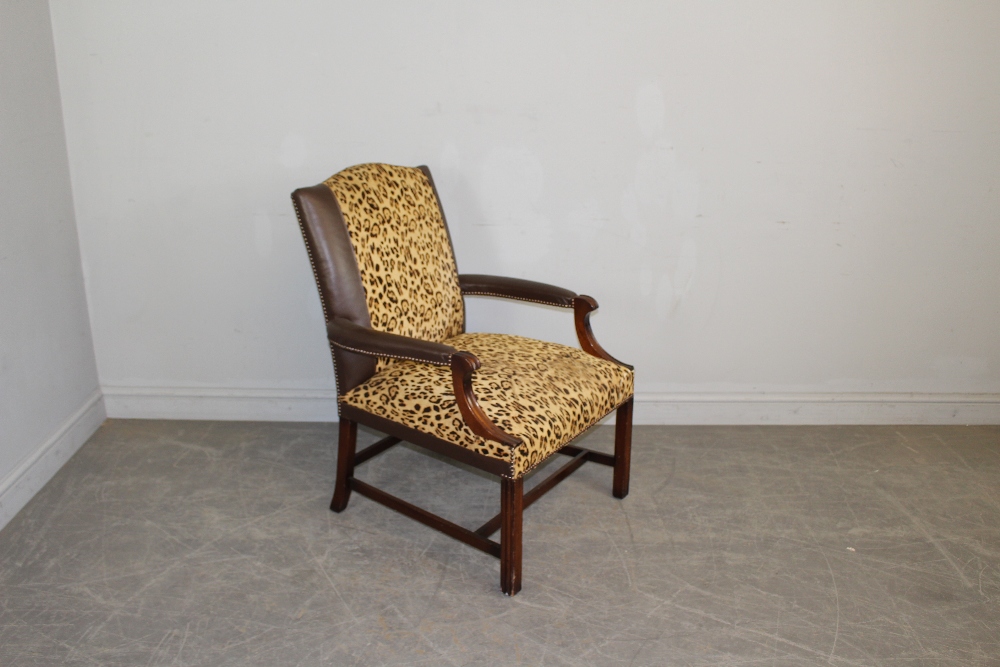 Leather & Leopard Print Fabric Armchair, with scrolled partially padded arms, raised on butterfly