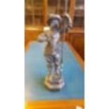 A cast Spelter Figure of a standing Cavalier holding a lance 63cm high