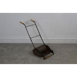 A vintage Webb 'Miniature' child's lawnmower, corrosion and paint losses, front roller AF, 53cm