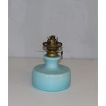 A 19th century blue opaque glass oil lamp with brass burner, marked Kosmos & Brenner to adjuster