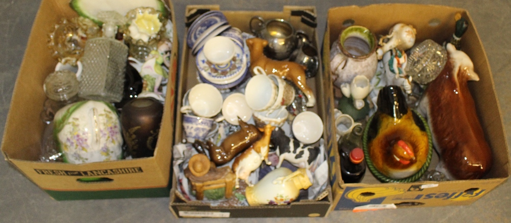 Three boxes of miscellaneous china and glasswares, including a large pottery hen on nest, a