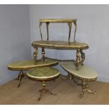 A group of four 1960's gilt metal and onyx topped coffee tables (4) two with celluloid protective