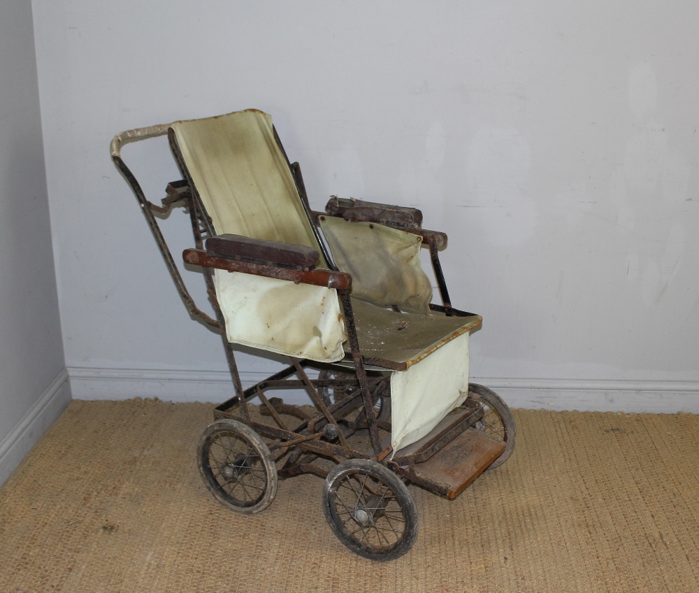 An early - mid 20th century 'Allwin' invalid's metal framed wheel chair 106cm condition commensurate