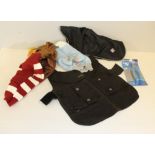 A Driza-Bone 'waxed' dog jacket and a small quantity of other dog coats, and nail clippers.