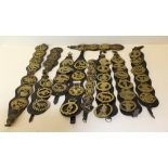 A group of eleven leather and leather effect martingales, with a selection of attached horse