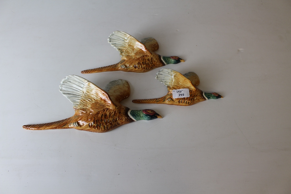 A graduating set of three Beswick pottery 'flying' pheasant wall plaques, models 661/1, 661/2 and - Image 4 of 5