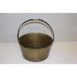 A brass jam pan with iron over handle 31cm x 26.5cm good condition, some corrosion to handle.