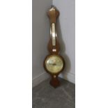 A 19th century mahogany wheel or banjo barometer, by Wilson, Penrith. With thermometer scale and
