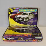 Two boxed Scalextric 'Road Rivals X1' Porsche Boxster S v Audi TT Coupe sets. Used but appears