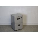 A grey-painted metal two-drawer filing cabinet, with keys 69cm x 39.5cm x 42.5cm good used