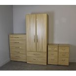 A modern Kingstown Furniture 'Evoque Oak' four piece bedroom suite, comprising a wardrobe, five