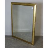 A large modern gilt framed mirror, with bevelled plate 114cm x 89cm damage to one corner, minor