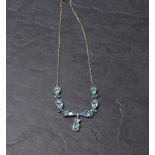 A vintage white metal and ''aquamarine' paste-set white metal necklace further set with