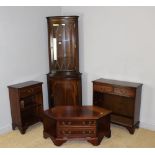 A group of modern reproduction mahogany furniture, comprising two small open bookcases, a glazed