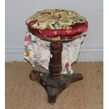 A Victorian rosewood revolving piano stool 53cm high distressed condition