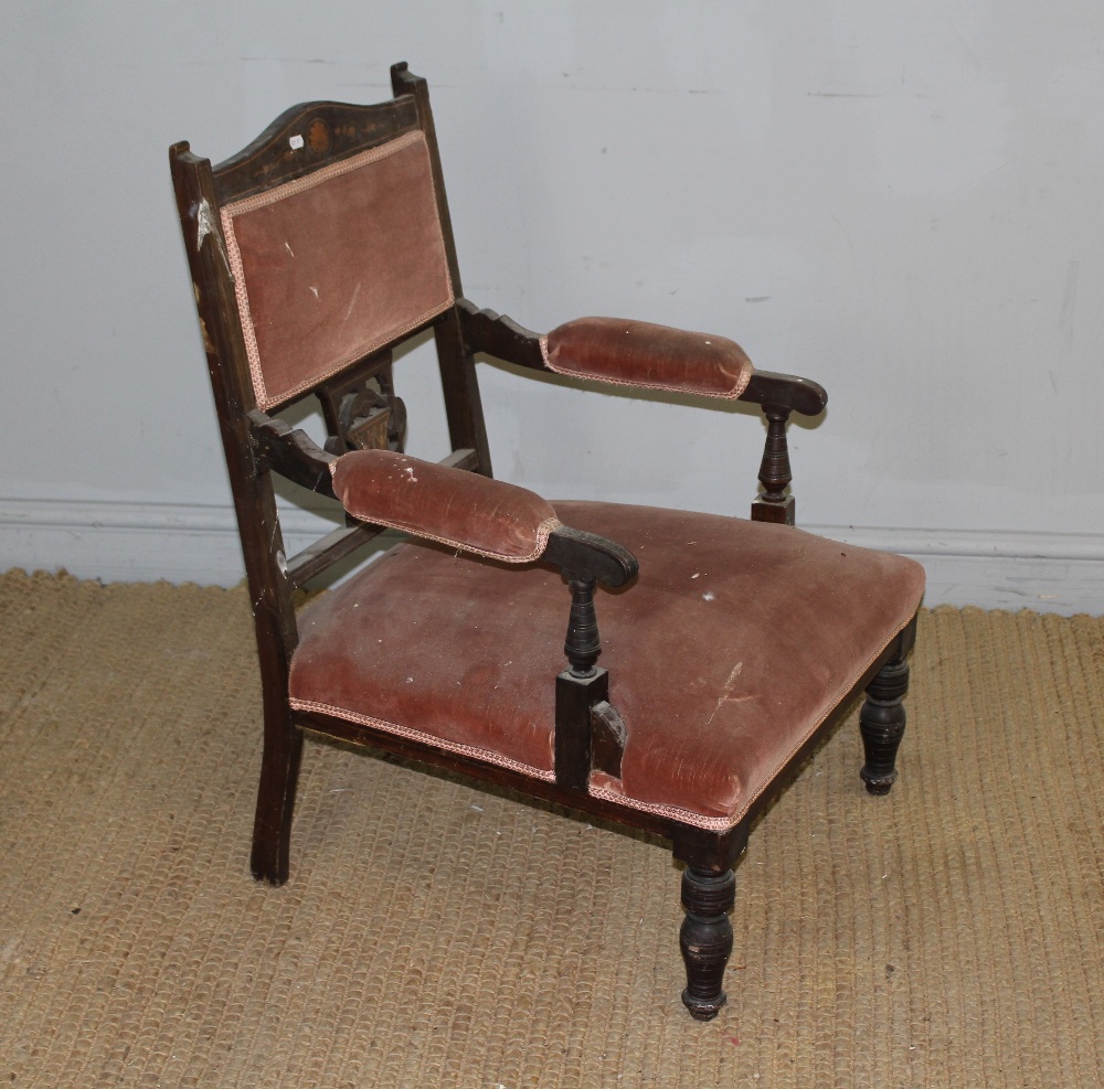 An Edwardian inlaid-mahogany open 'salon' armchair, of traditional design with pink velour