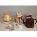 A selection of miscellaneous china, toilet jug and bowl sets, Staffordshire style dog, Enamelled