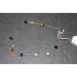 A white metal and spherical semi-precious gem bead necklace 19cm good condition.