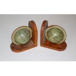 A pair of reproduction globe bookends 14.5cm some minor marks and small edge losses to paper