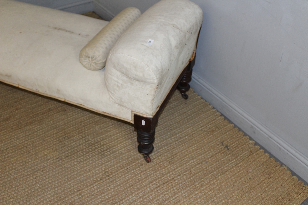 A Victorian mahogany framed chaise longue or day bed, with sprung seat and padded back raised on - Image 3 of 3