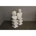 A pair of cast and white-painted composite stone Romanesque busts and pedestals 96cm & 92cm damage