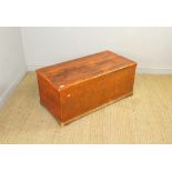A antique red stained-pine blanket box, of rectangular form with hinged top and moulded base 44cm