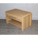 A modern light oak effect television stand, with single drawer 54cm x 88cm x 52cm some ring stains