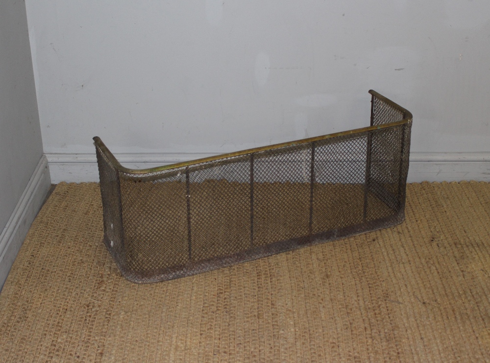 A 19th century brass and wire mesh fender/spark guard 38cm x 100cm x 30cm some corrosion and