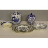 A small group of blue and white pottery, including an ashette, bowls and Oriental design lidded