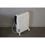 A DeLonghi 'Dragon4' electric radiator 64cm x 41cm good used condition.