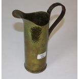 A brass shell case 'Trench Art' jug with applied copper loop handle 25cm high, good condition.
