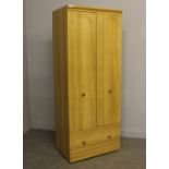 A modern 'Alstons' light oak effect double wardrobe with base drawer, 190cm x 76cm x 52.5cm good