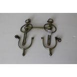 A horse bit 16.5cm wide and a pair of vintage spurs 7cm good used condition.