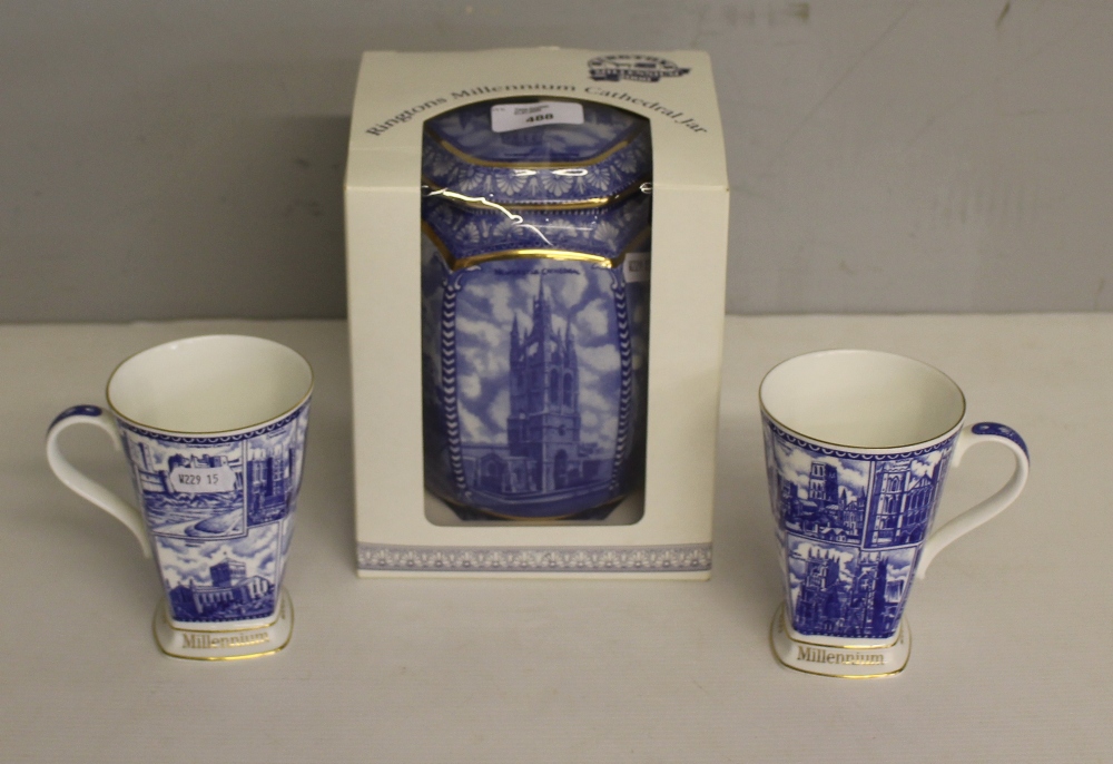 A Ringtons Millenium Cathedral jar, boxed 20cm and two Ringtons Millenium 2000 cups 11,5cm good
