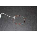 A 925 grade white metal bracelet, set with pear-shaped amber and turquoise cabochons, 18cm good used