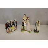 A group of three 19th century Staffordshire pottery figures, Romeo & Juliet modelled as Susan and