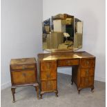 A 1940's walnut dressing table, with triple mirror 155cm x 107cm x 48cm marks and scratches, and a