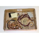 A box of mixed jewellery, including a vintage yellow metal bangle, silver ear hoops and drops,