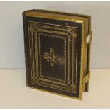 A gilt-tooled leather bound 'Brown's' family bible, with embossed gilt brass edges and clasps 34cm