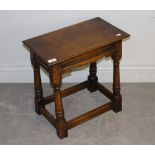 A good reproduction oak joint stool, of 17th century design 48cm x 47cm x 27cm good condition.