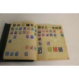 A Broadway Worldwide stamp album, partially complete, together with a green cloth covered 'The