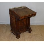 A Victorian burr-walnut veneered davenport, with short three-quarter pierced brass gallery over