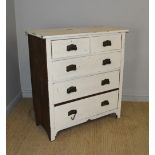 A late Victorian white-painted oak chest of drawers, two short and three long drawers each with