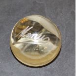 An early 20th century glass menu holder cum match striker, of spherical form with ribbed base