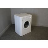 An Indesit W1A101 washing machine 84cm x 60cm x 50c, used condition.