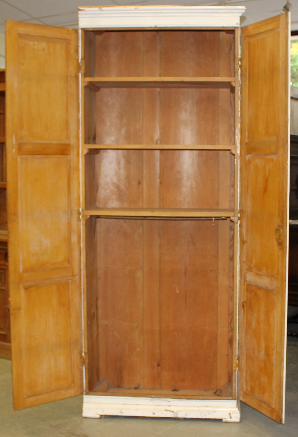 A large 19th century painted pine cupboard, with two triple panelled doors enclosing the internal - Image 3 of 5