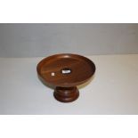 A turned mahogany tazza/pedestal bowl 17.5cm x 27.5cm generally good.