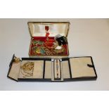 A vintage musical jewellery box and a selection of costume jewellery