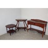 A modern mahogany effect two-drawer side table, with short raise back and serpentine fronted top,